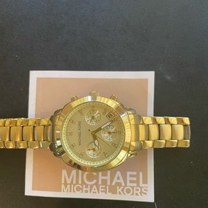 Gold MK watch with diamonds on face